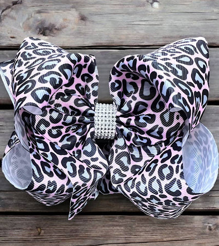 SOFT PINK ANIMAL PRINTED HAIR BOWS.
