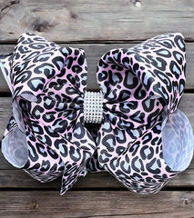 SOFT PINK ANIMAL PRINTED HAIR BOWS.