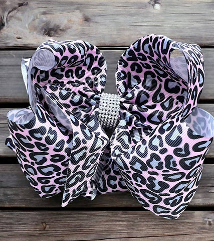SOFT PINK ANIMAL PRINTED HAIR BOWS.