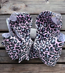 SOFT PINK ANIMAL PRINTED HAIR BOWS.