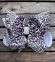 SOFT PINK ANIMAL PRINTED HAIR BOWS.